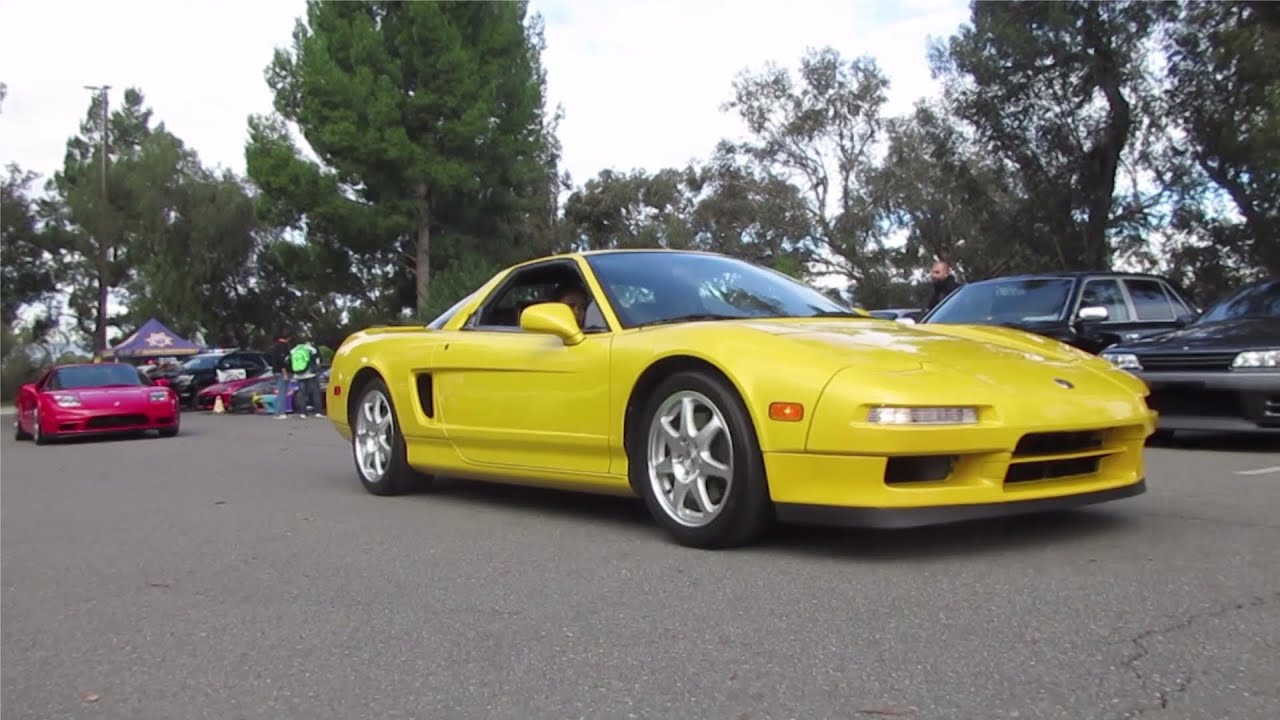 Two Acura NSXs (Spa Yellow Pearl, New Formula Red)