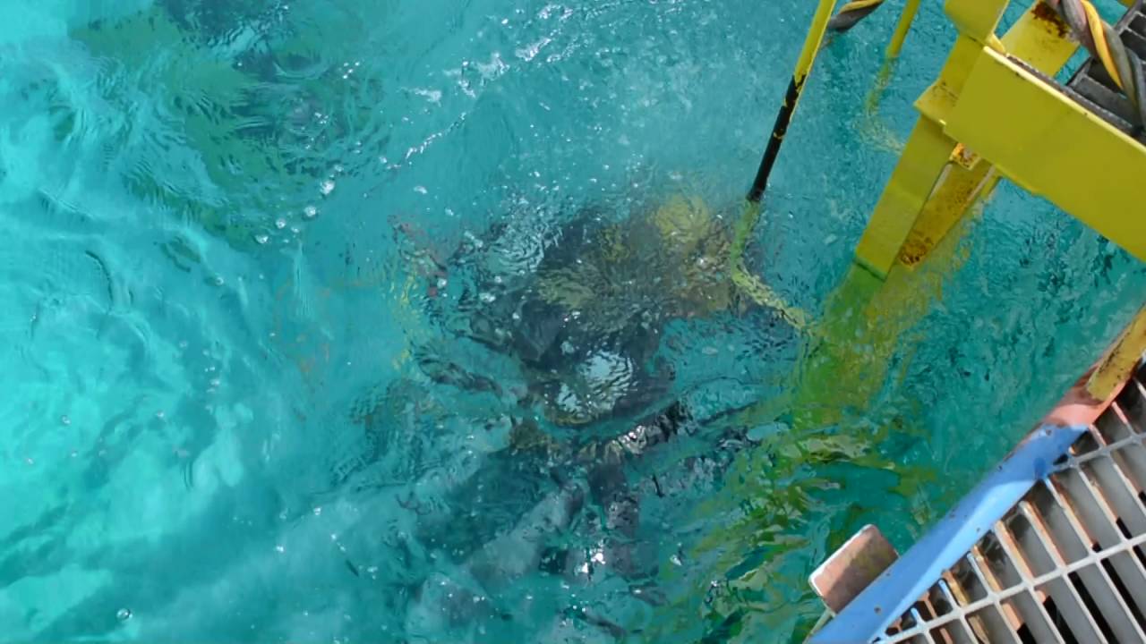 Diver entering water at National Hyperbaric Centre's Test Tank