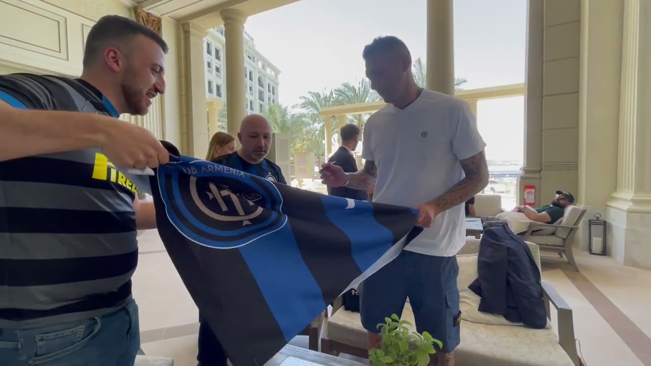 Marco Materazzi is signing Inter Club Armenia flag!