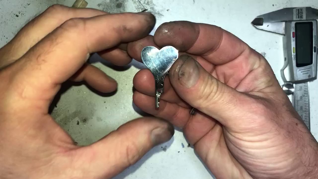 Fitting the silver chastity key