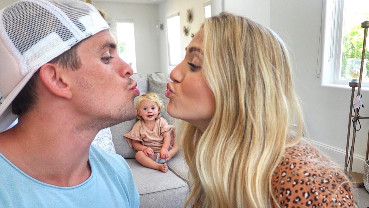 Kissing in front of our 1 year old daughter to see how she reacts... *Hilarious Reaction*