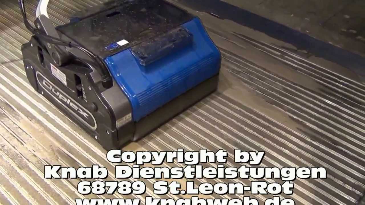 Reinigen von Schmutzfangmatten