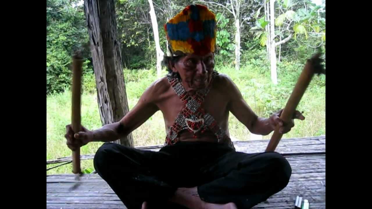 Amazon Explorer - Shuar shaman from the Peruvian Amazon jungle