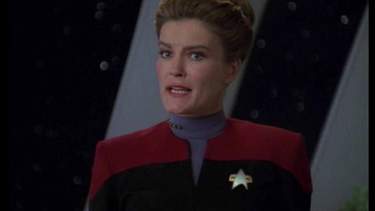 Grenade; Janeway & Chakotay