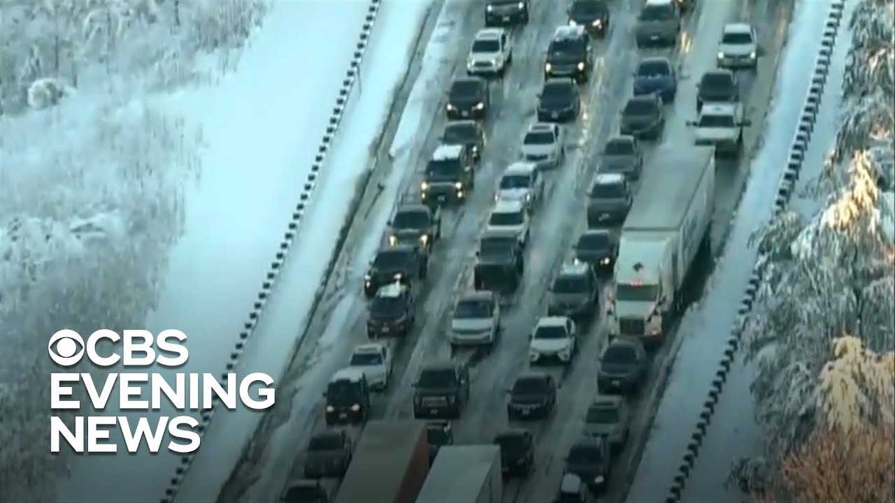 Drivers endure frigid night on impassible highway