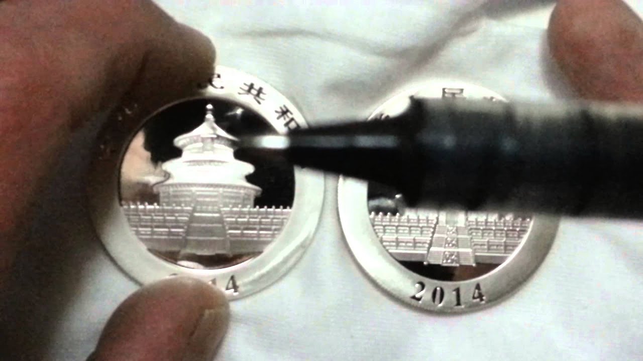 Counterfeit Chinese Panda compared to real coin. Part 1, inspecting the coin