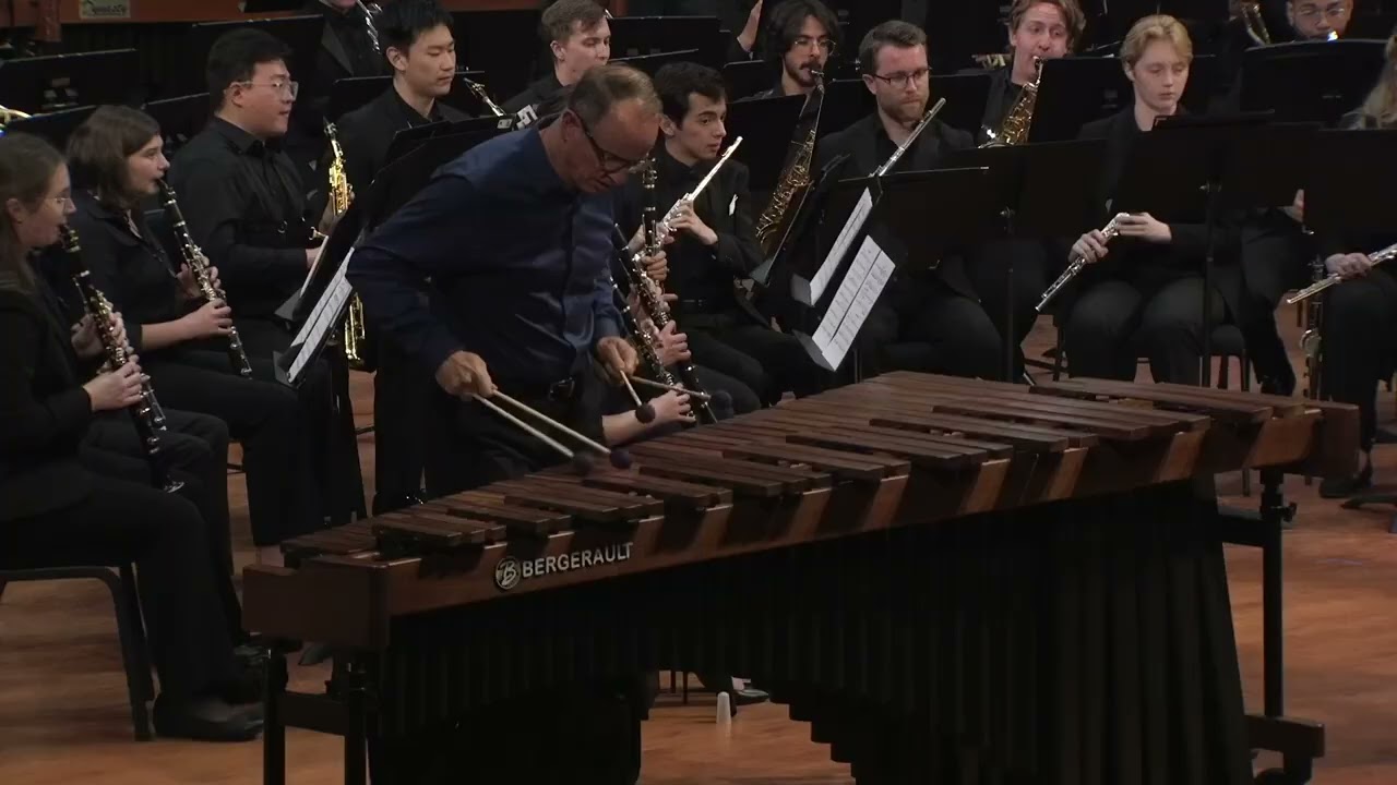 Moon Chasers with Wind Ensemble by Mark Ford