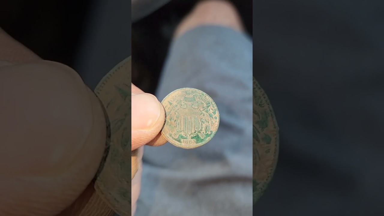 1865 2 cent with a rotated die error coin.
