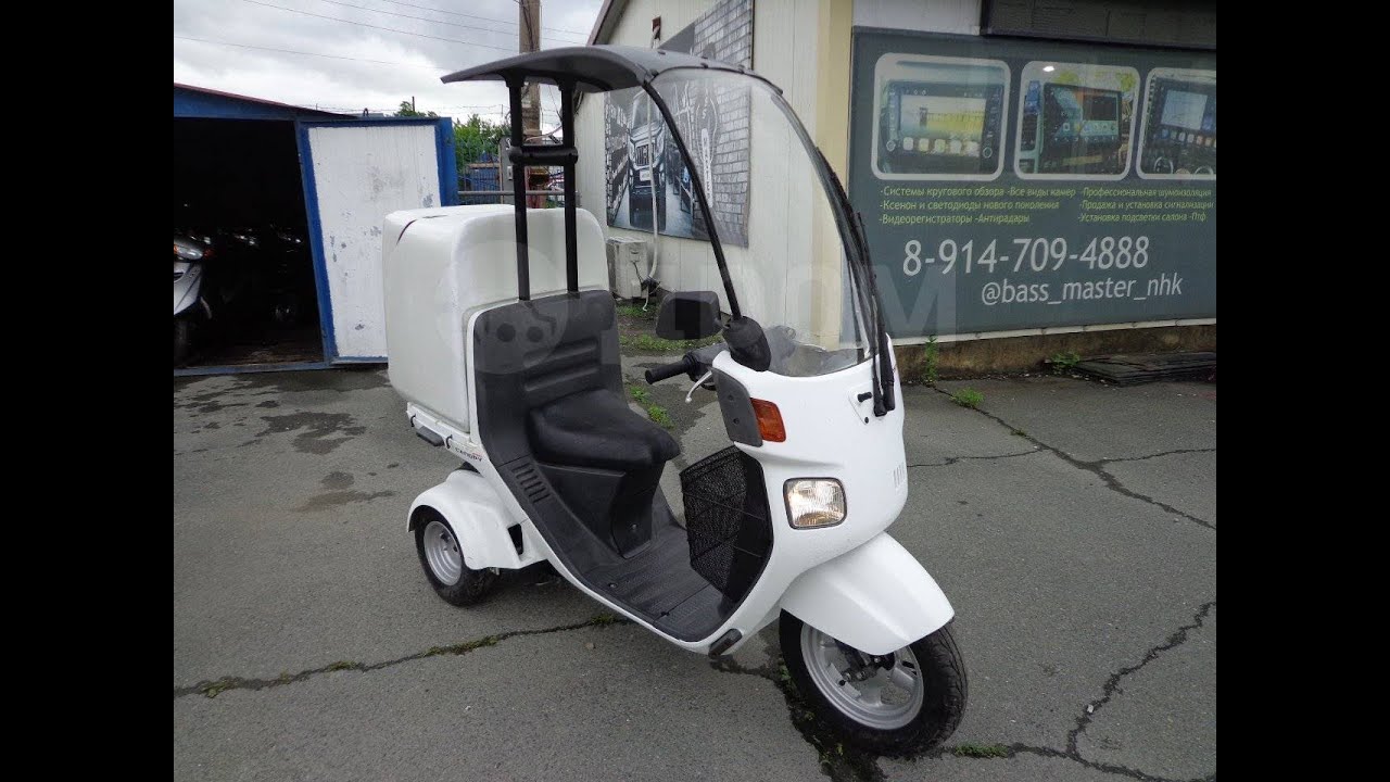 Honda Gyro Canopy-2 TA-03 с четырехтактным двигателем.