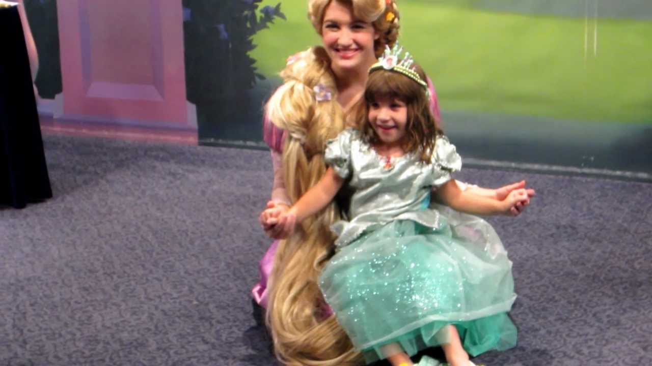 Belle, Ariel and Rapunzel with Sylvia at Disney World dancing princesses