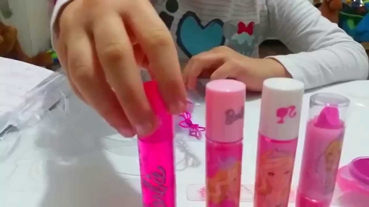 Barbie makeup set tutorial for children . Kit for girls. Cute  video