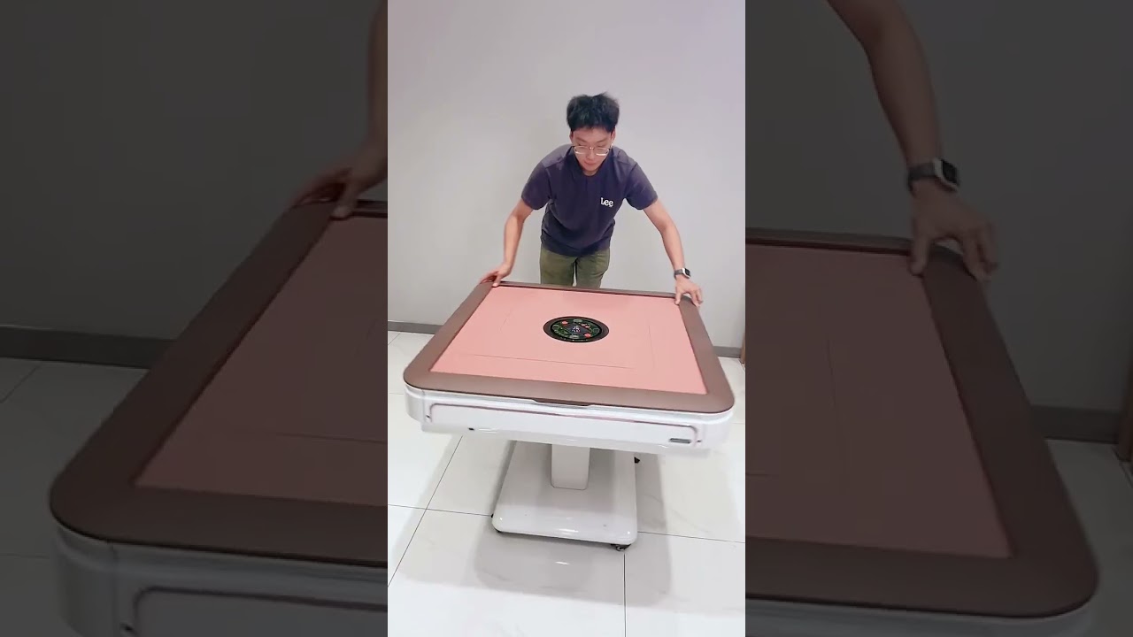 This device is a folding automatic Mahjong table.