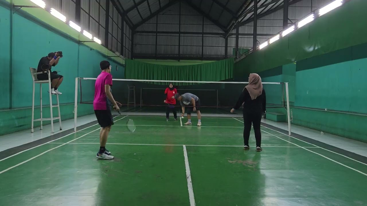 Vivi/Wahyu Vs. Titi/Pepi