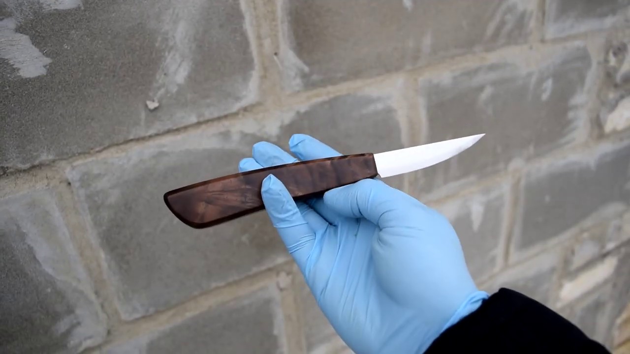 Sloyd knife for woodcarving.  For carving spoons.