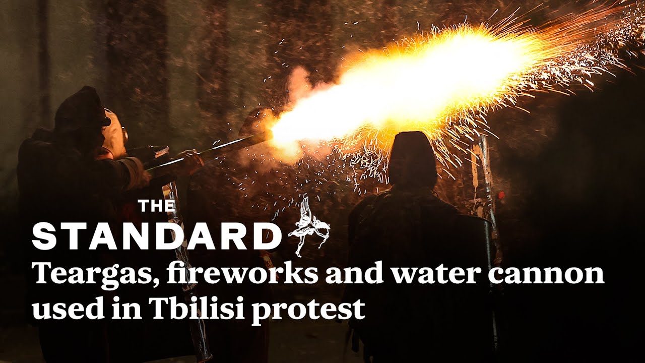 Teargas, fireworks, water cannon used at Tbilisi protest after the country's EU bid was suspended