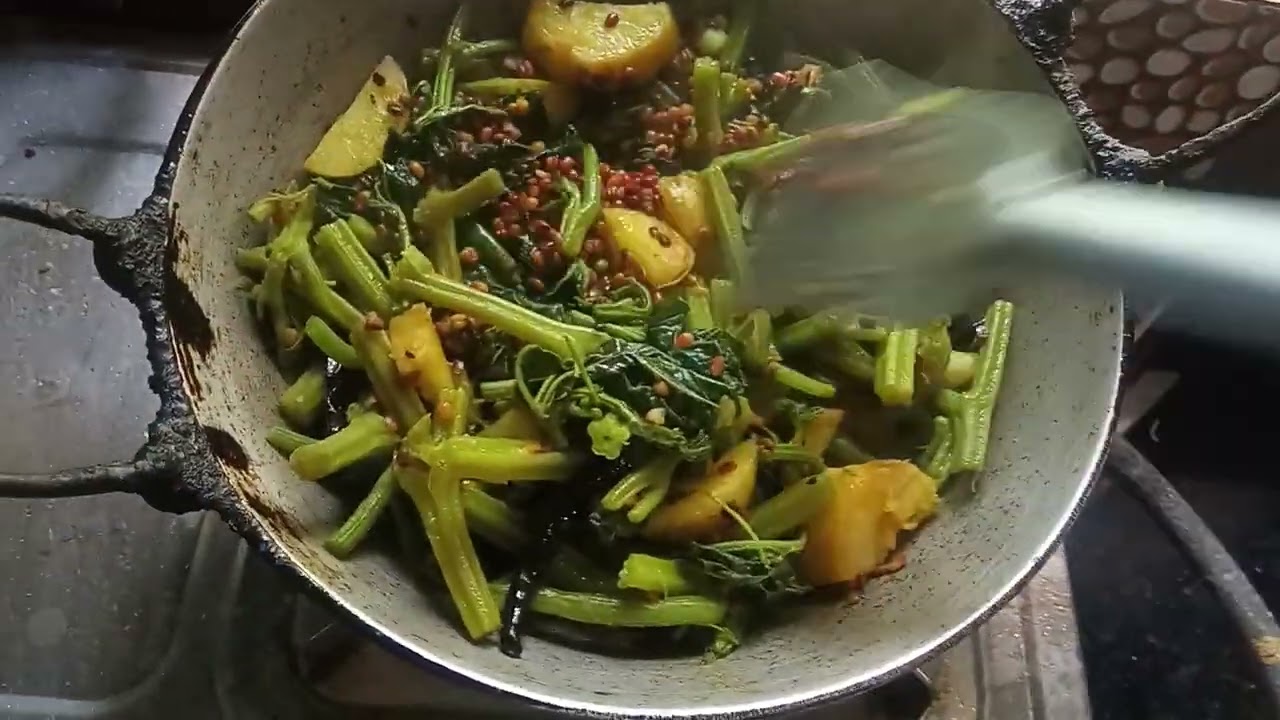 Tasty lunch recipe. Cooking shows mixed vegetables and chilli pokora. 