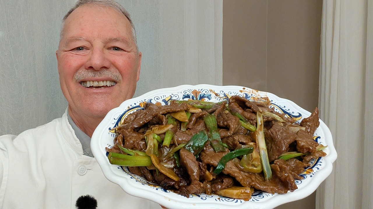 Нежное мясо говядины с зеленым луком, приготовленное методом жарки в воке — невероятно нежное и в...