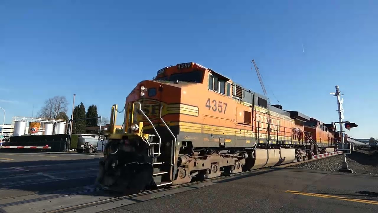 (Northbound) BNSF Loaded Oil Train passes through the 3RD Street Northwest Railroad Crossing.