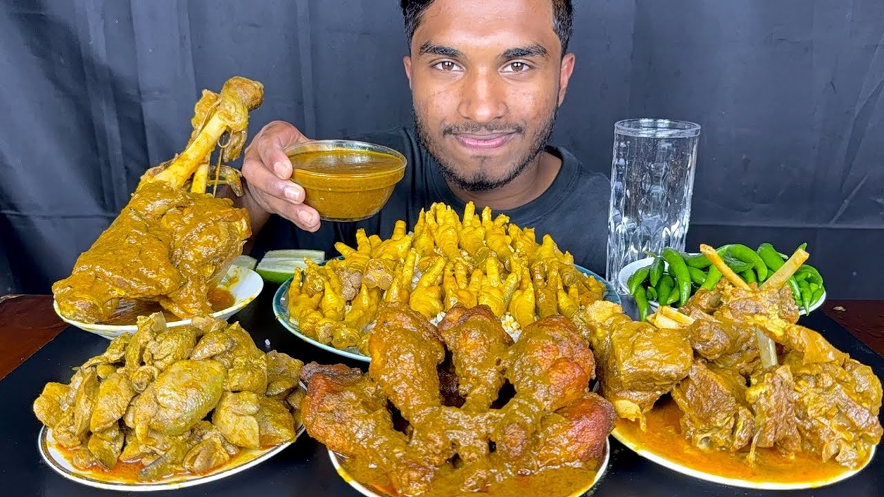 eating spicy mutton leg curry, chicken liver , chicken leg curry and chicken feet curry with rice