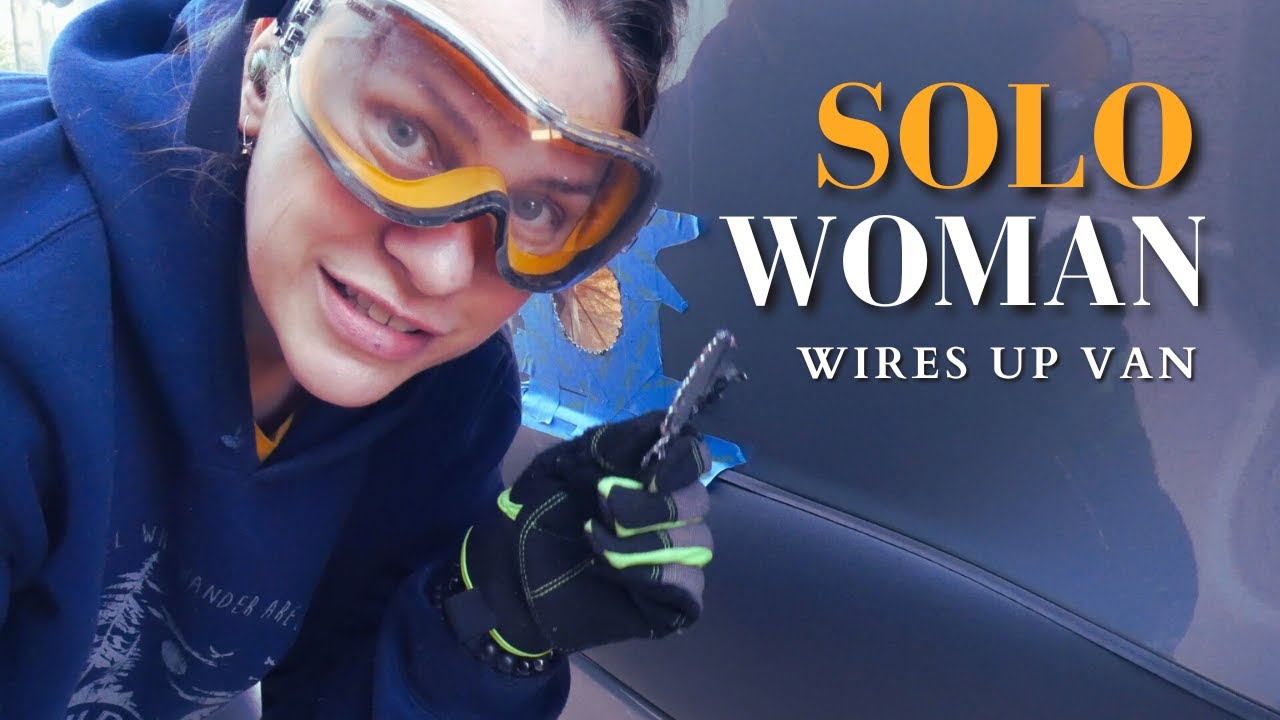Novice woman installs chassis ground, 30 amp, & solar electric ports on van build