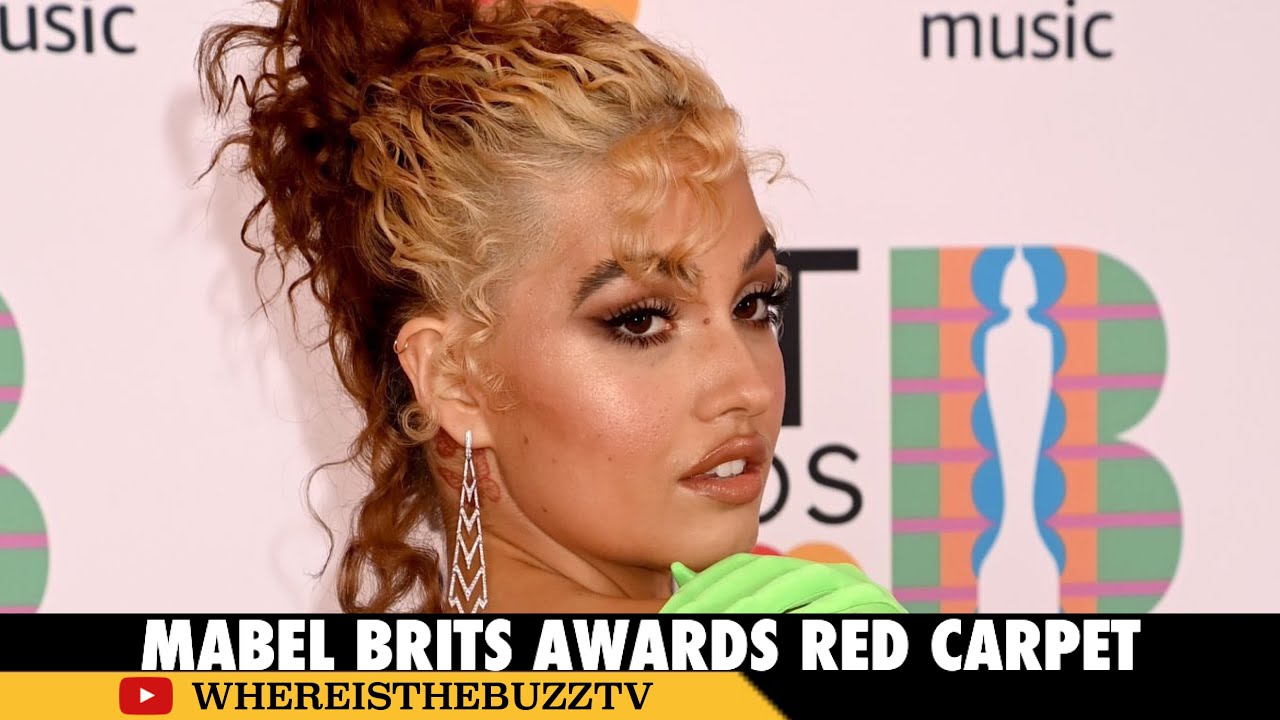 Mabel Blesses the BRITs Awards Red Carpet in a Gorgeous Green Dress