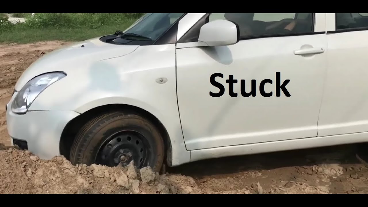 White Car Stuck in Sand