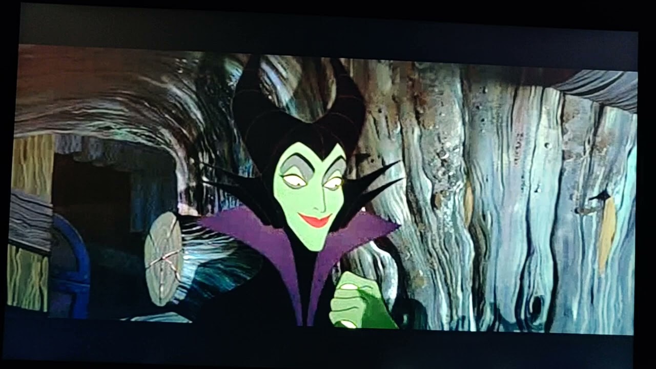 Tiffany Rountree wearing sky blue jeans with black belt and red shirt tucked in