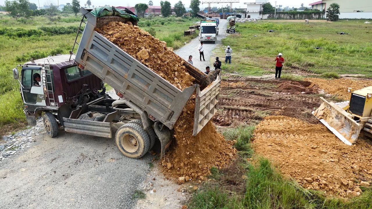 Perfectly! Opening Landfill Project Processing Filling Up Some Stone By 5T Dump Trucks And Bulldozer