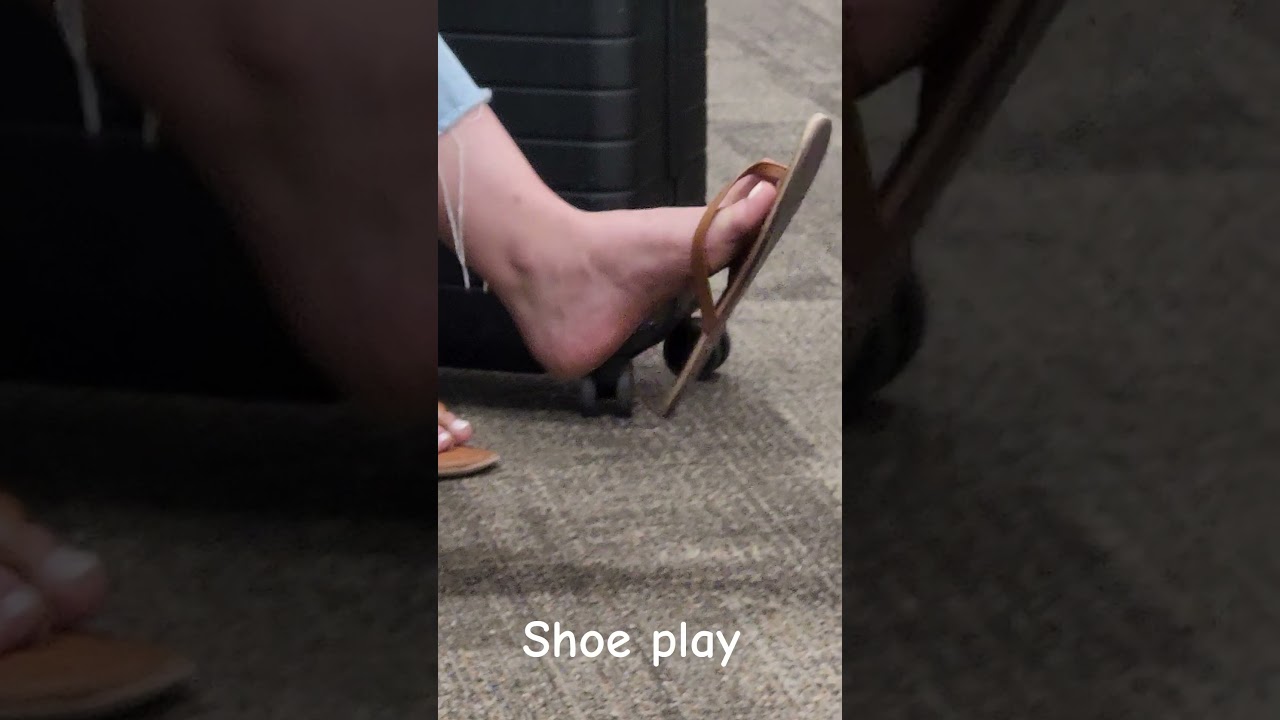 Shoe play at the airport #shoeplay #dangle #sandals #feet #foot #legs