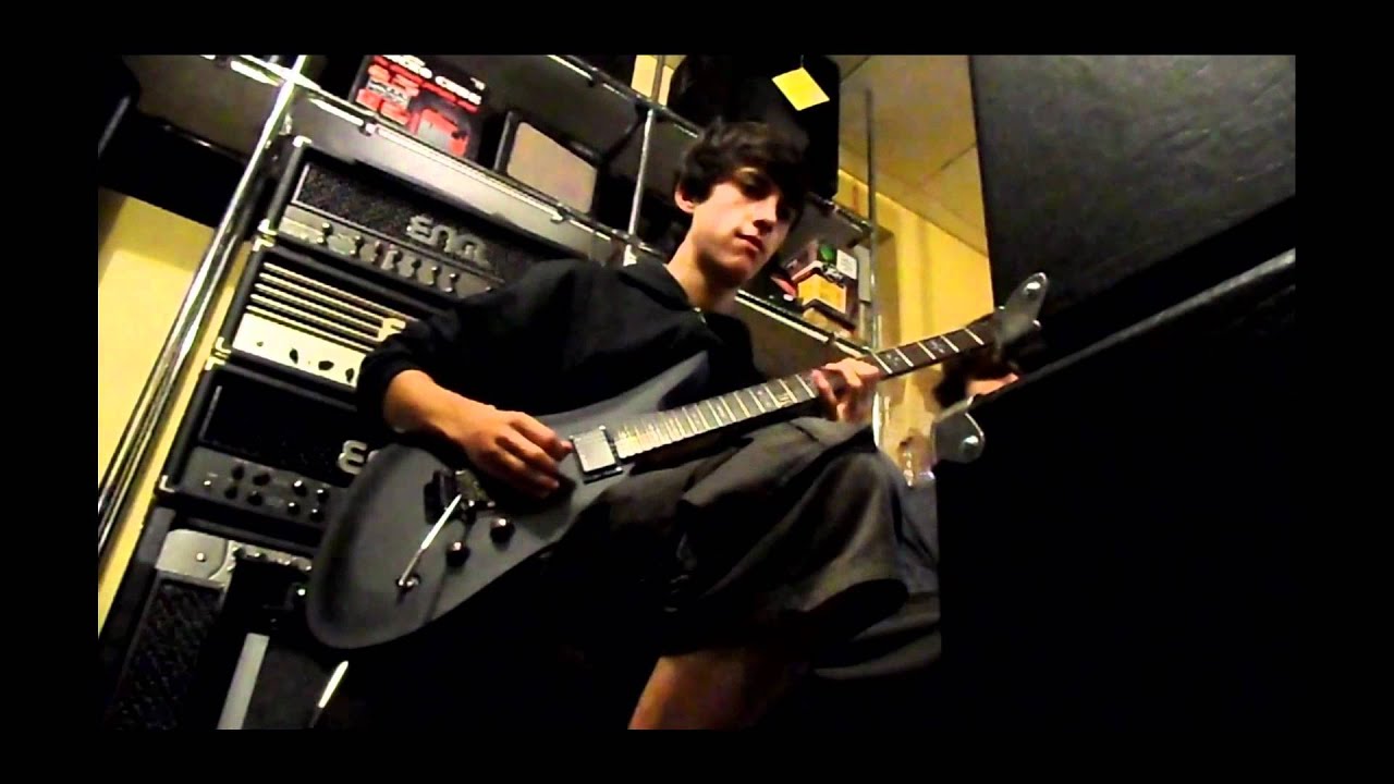 Testing guitars in a music shop - Schecter Revenger and Schecter Sunset Extreme