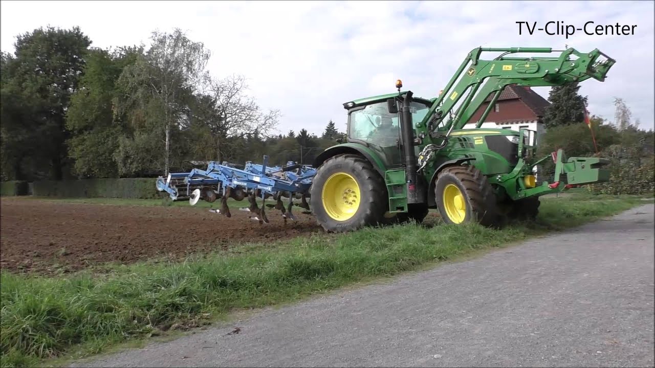 Zusschauen und entspannen - Traktor bei der Arbeit  - Tractor work in field