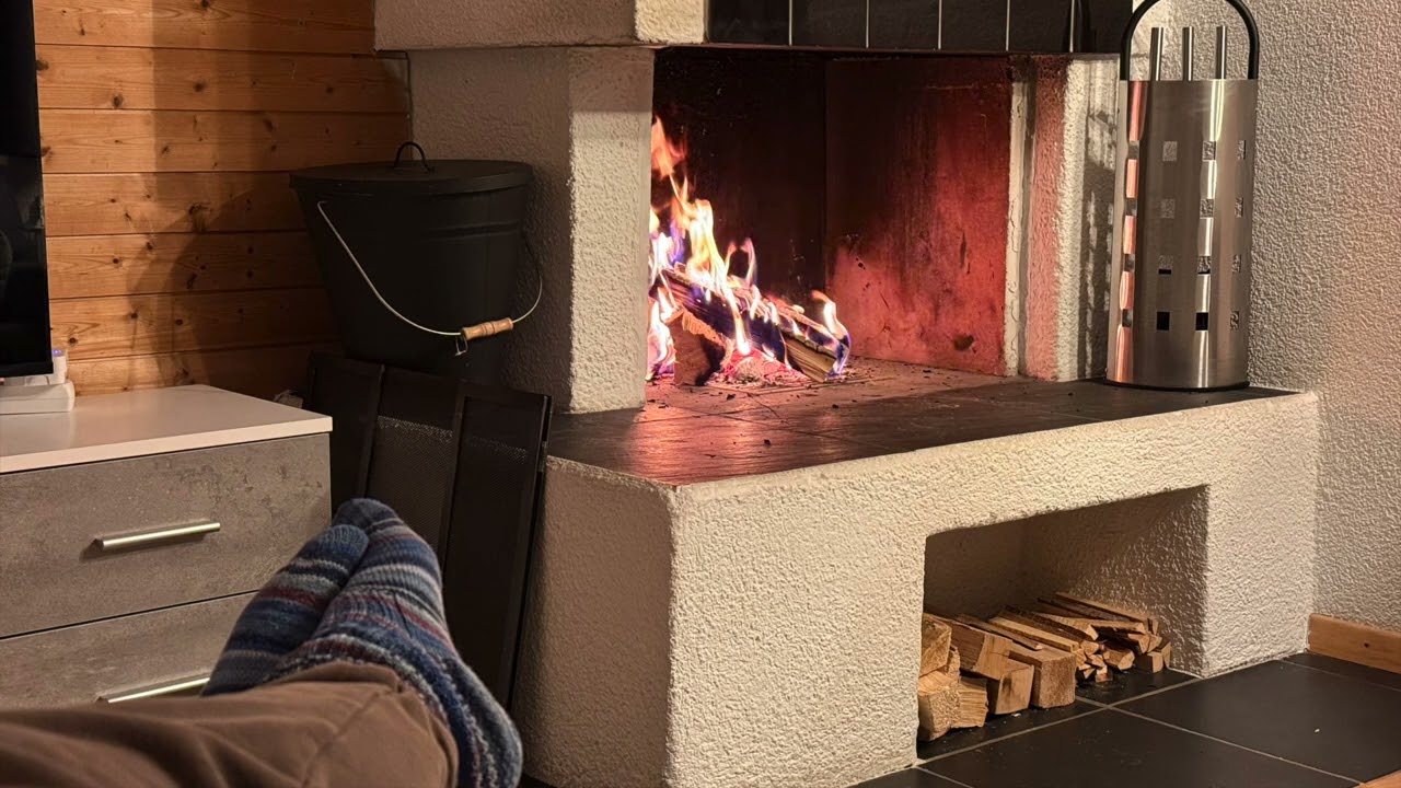 Open fireplace in a Swiss Alpine chalet on New Year's Day