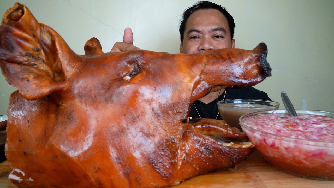 You Won't Believe What This Crazy Lady Does To A Pig's Head