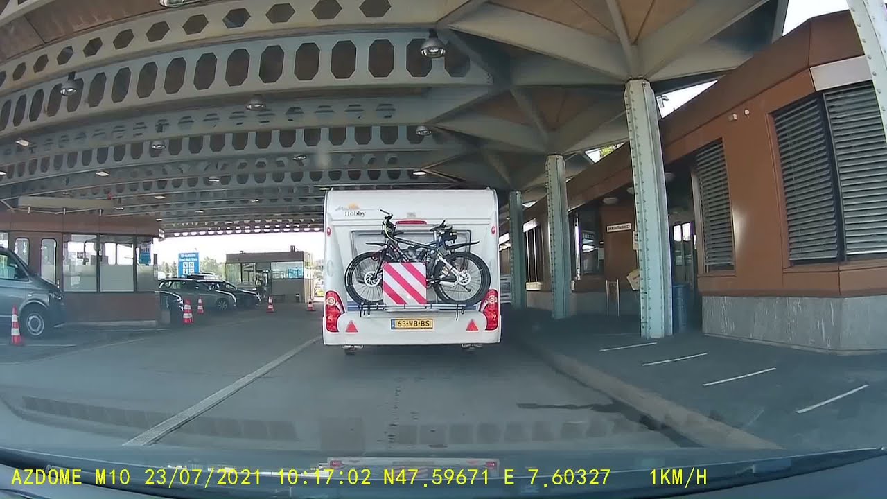 050- Hoe de (lange rij bij de) Zwitserse grens omzeilen.
