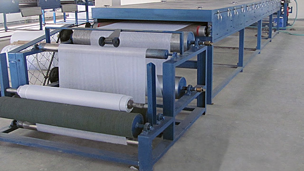 Single dot interlining coating machine