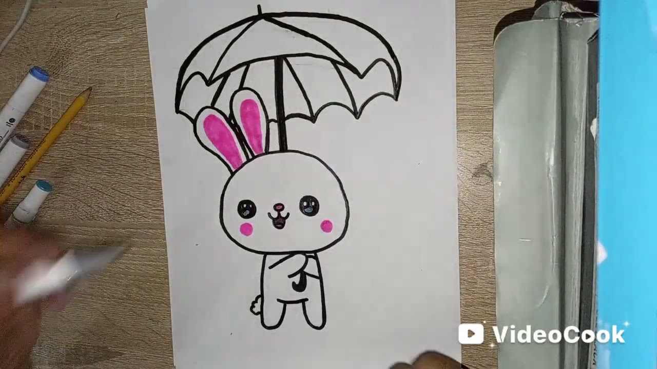Para el día de hoy escogí dibujar un conejito con un paraguas 🌂☂️☔