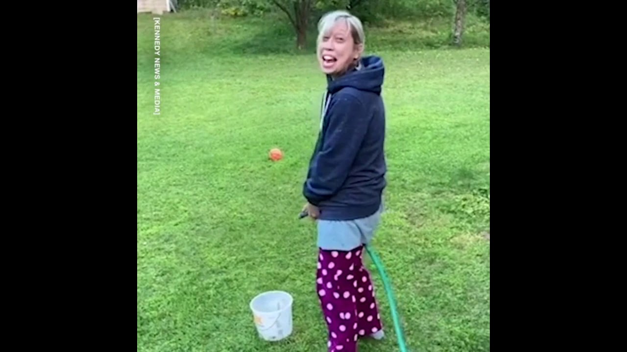 Man sick of wife complaining about poor toilet aim challenges her to try with bucket and hose