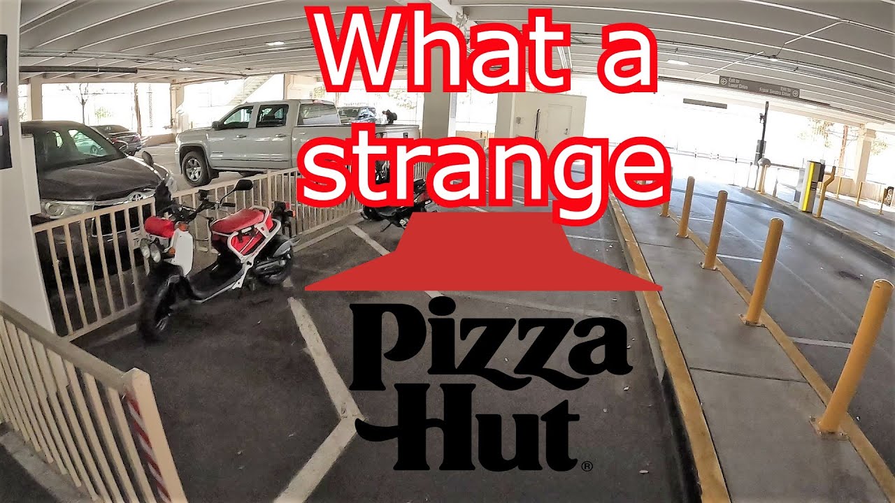 Riding a Honda Ruckus scooter to an Unusual Pizza Hut in Las Vegas