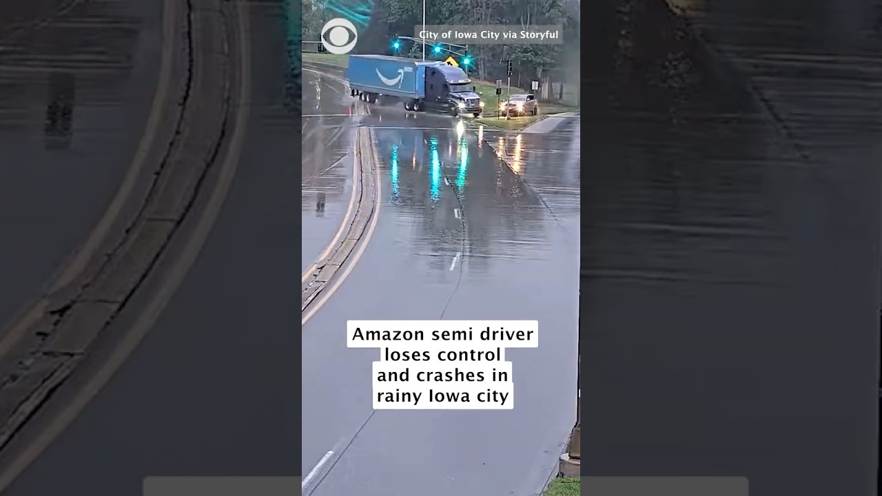 Traffic camera video shows driver of Amazon semi-truck lose control and crash in Iowa #shorts