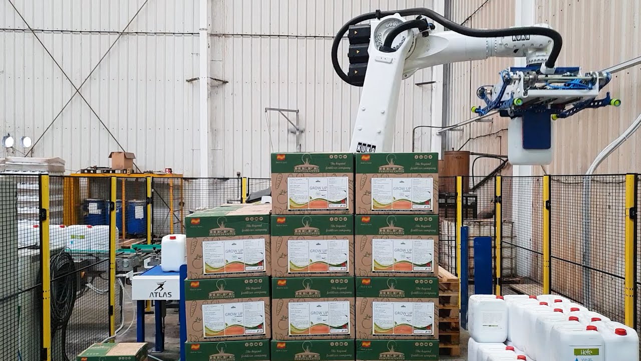 Robotic arm for palletising crates and fertiliser drums