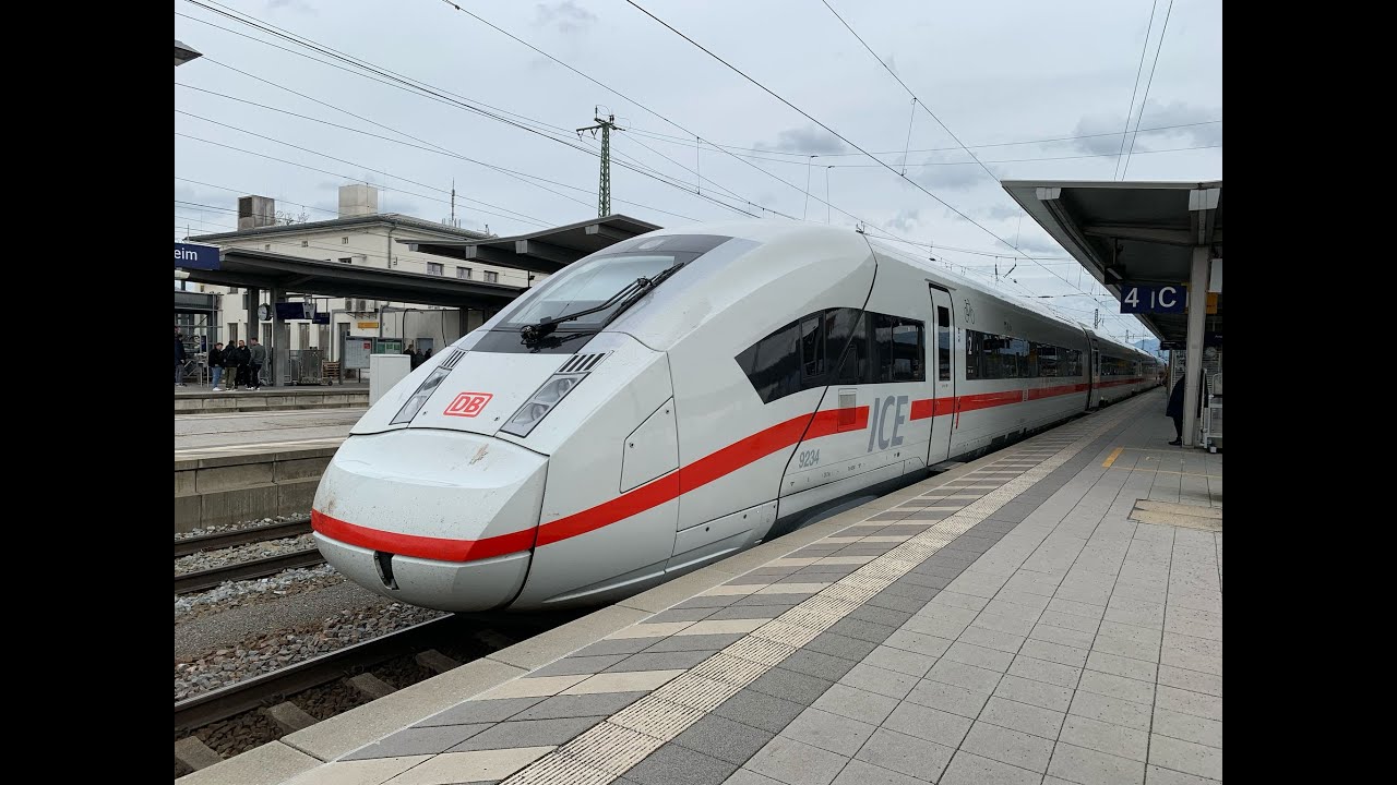 Zugverkehr im Bahnhof Rosenheim mit Rosenheimer Kurve
