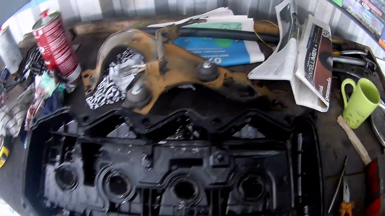 NISSAN FRONTIER ,Vazamento na junta da tampa de valvulas,