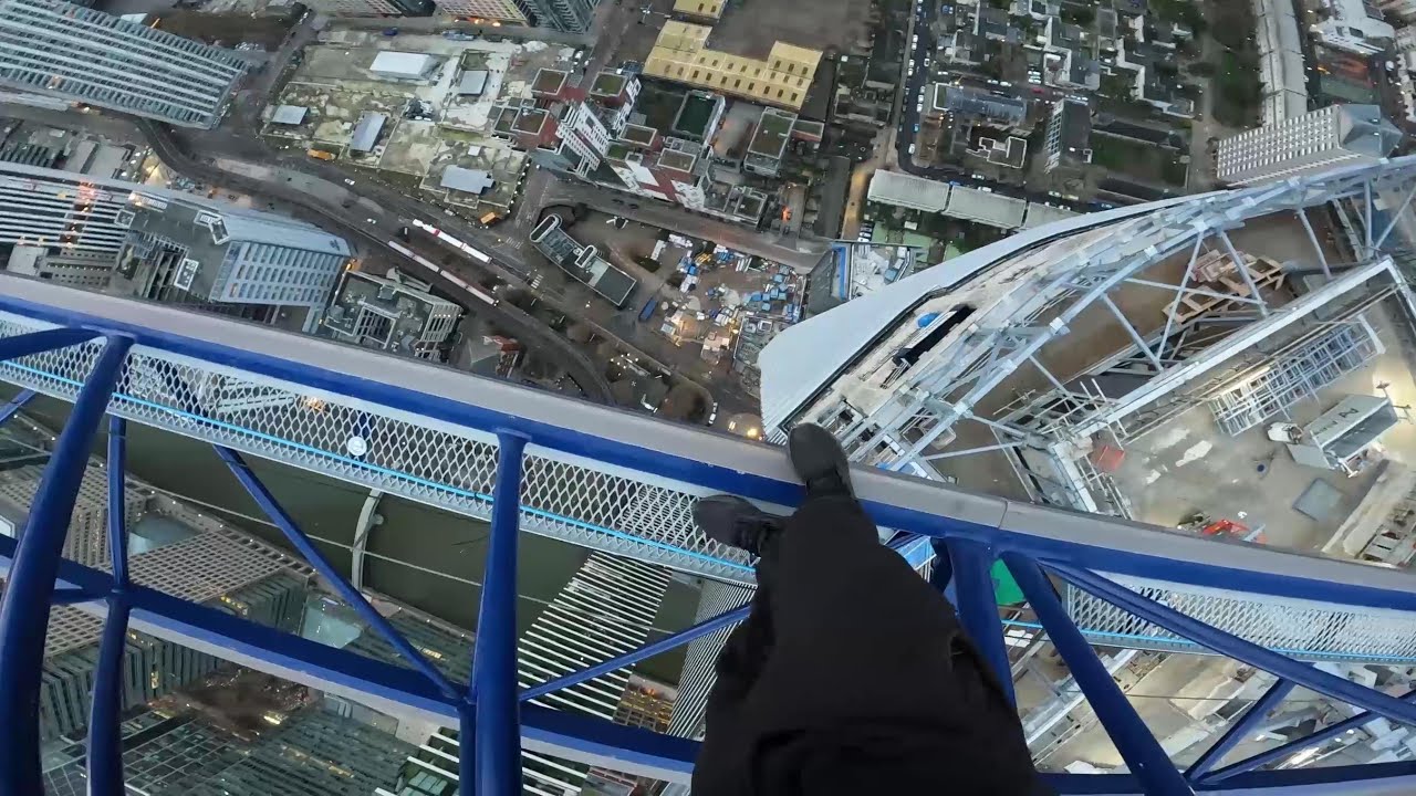 climbing a 230m crane over canary wharf