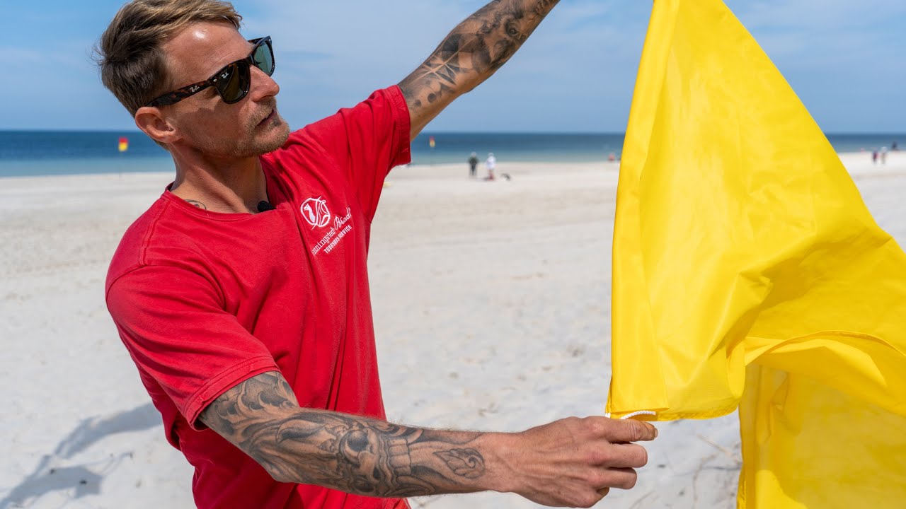 Baden in der Nordsee - Was bedeuten die Flaggen am Strand?