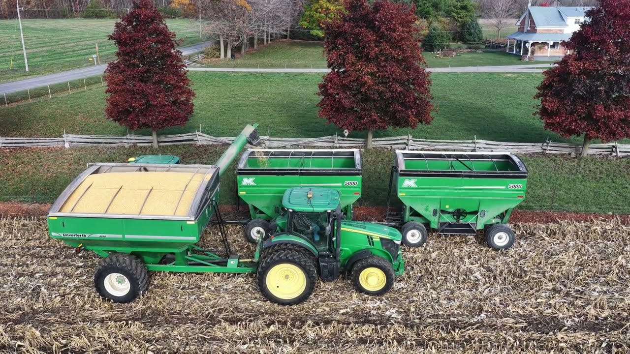 CANADIAN FARMER - JOHN DEERE IN THE CORN. SHORT OR TALL, WE CUT IT ALL.