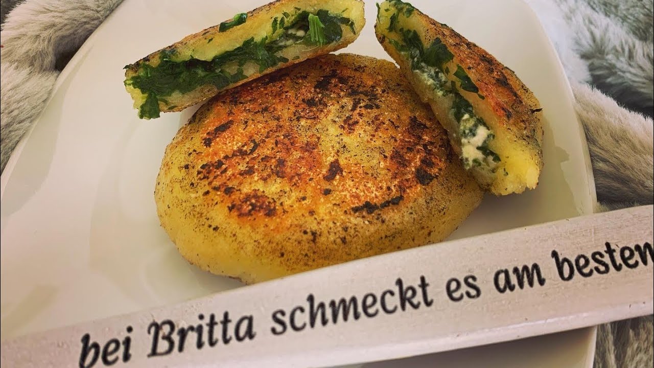 Gef&uuml;llte Kl&ouml;&szlig;e mit Schinken K&auml;se und Spinat feta . halb und halb Klo&szlig;teig