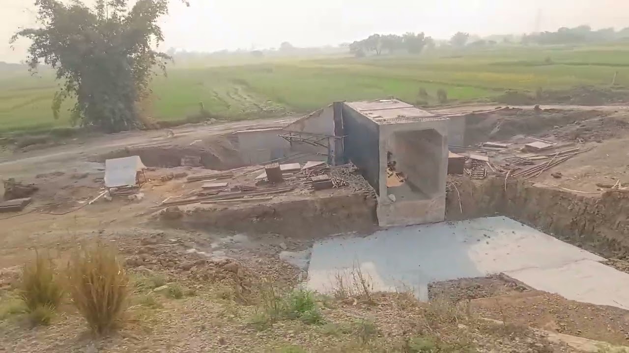 13344 depart SBDR || double line work on progress, bridge on the minor river|| Greenfield near track