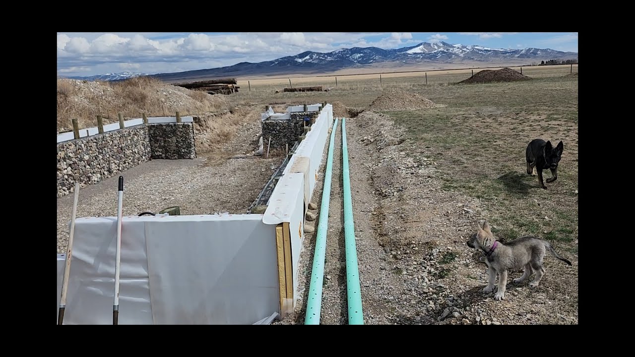 Step 15: Installing drain system along south wall in pit greenhouse/Walipini