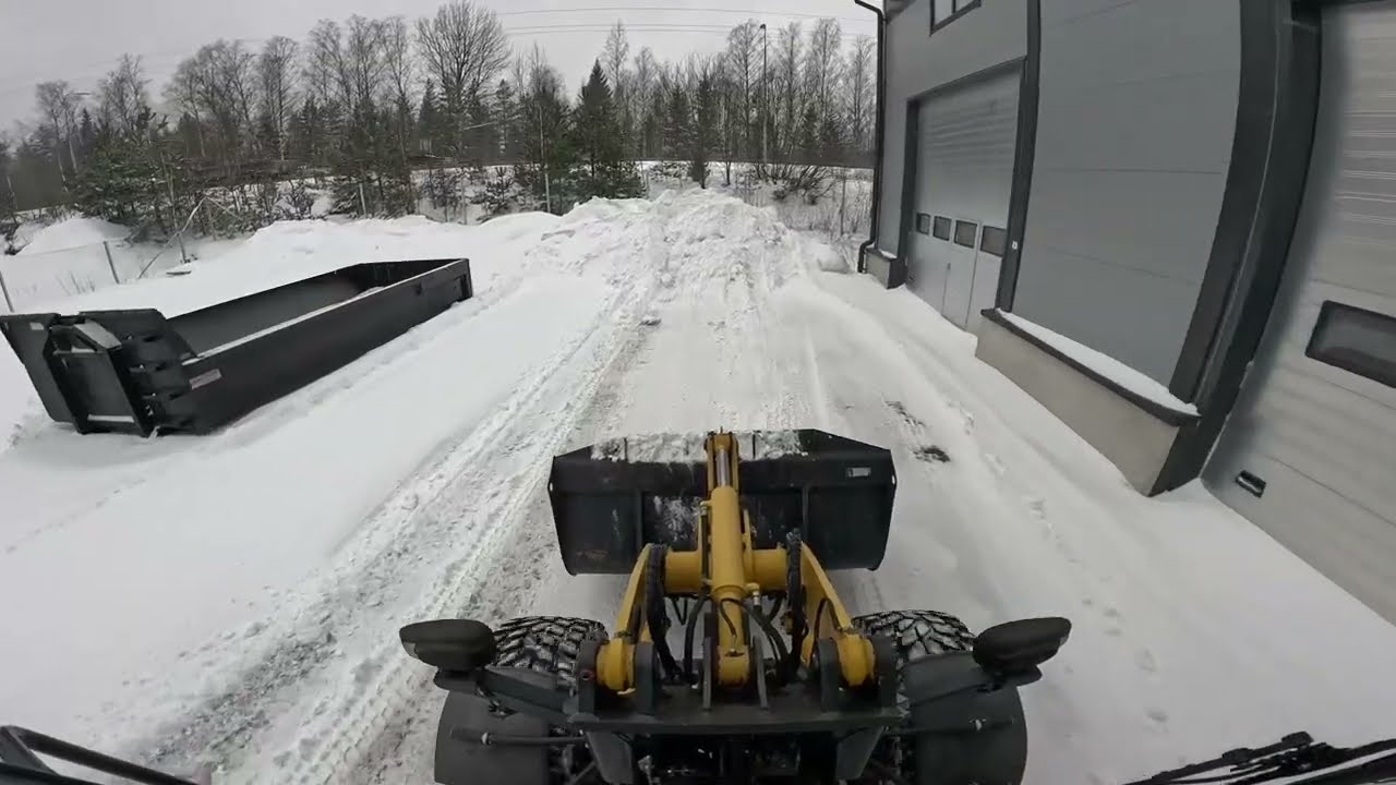 Plowing snow Komatsu WA80m