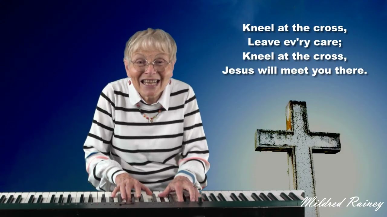 KNEEL AT HE CROSS